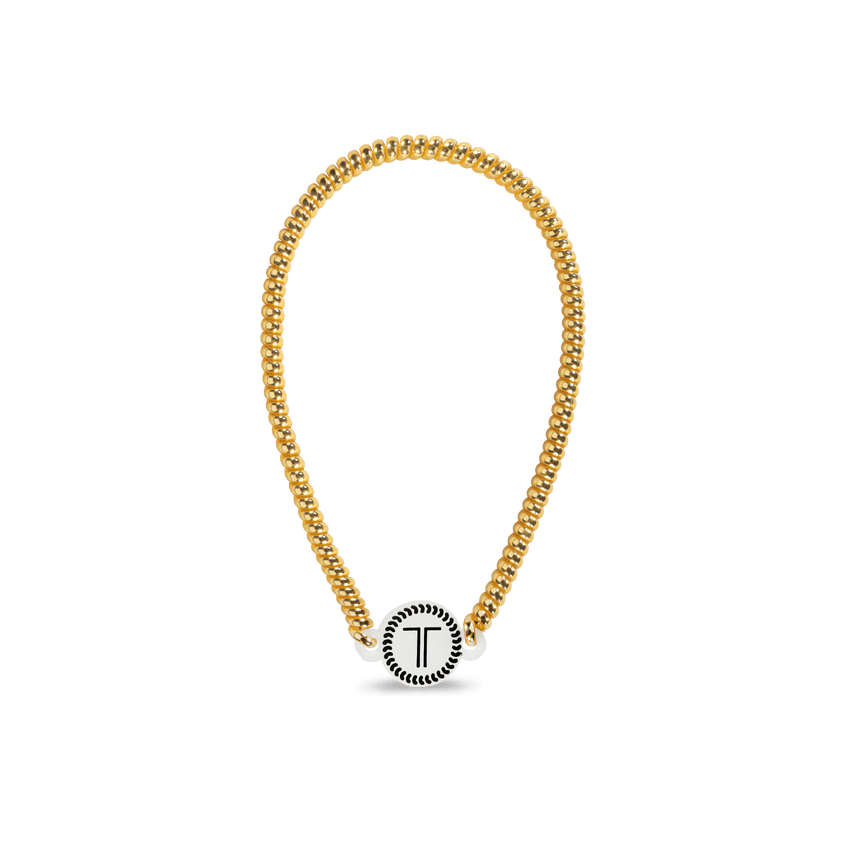 Gold Teleties headband featuring a stylish design for secure and comfortable wear