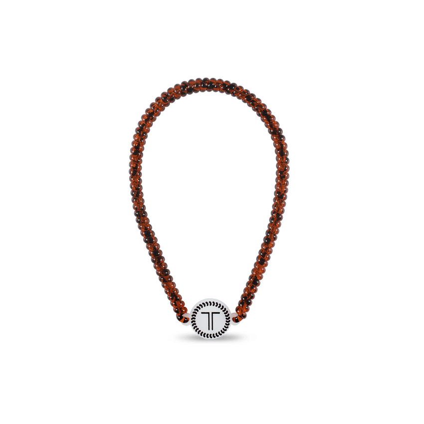 Teleties headband in amber color featuring a stylish design for comfortable wear and secure styling