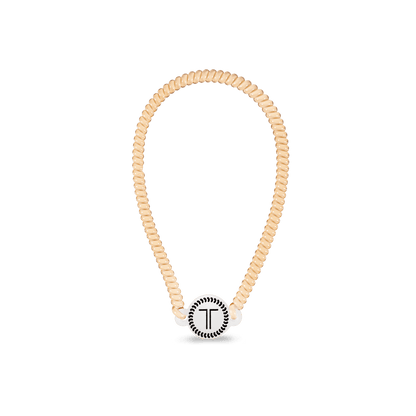 Teleties headband in beige with a stylish T logo for comfortable and secure hair management