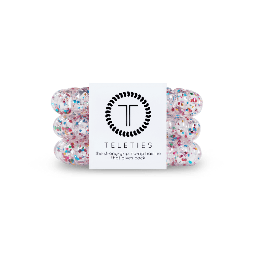 Teleties strong grip hair ties in clear with colorful glitter for secure and comfortable styling