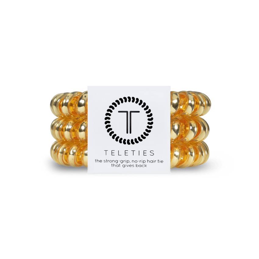 Teleties strong grip hair ties in golden color for a stylish and secure hold without hair damage