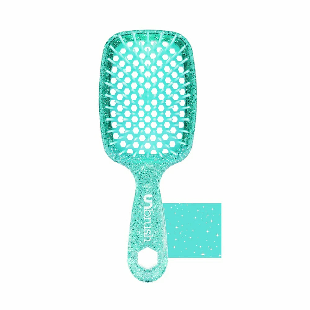 Unbrush detangling hair brush in teal with a glittery finish and flexible bristles
