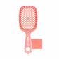 Unbrush detangling hair brush in glittery pink for smooth and easy hair styling