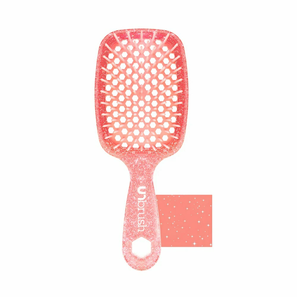Unbrush detangling hair brush in glittery pink for smooth and easy hair styling