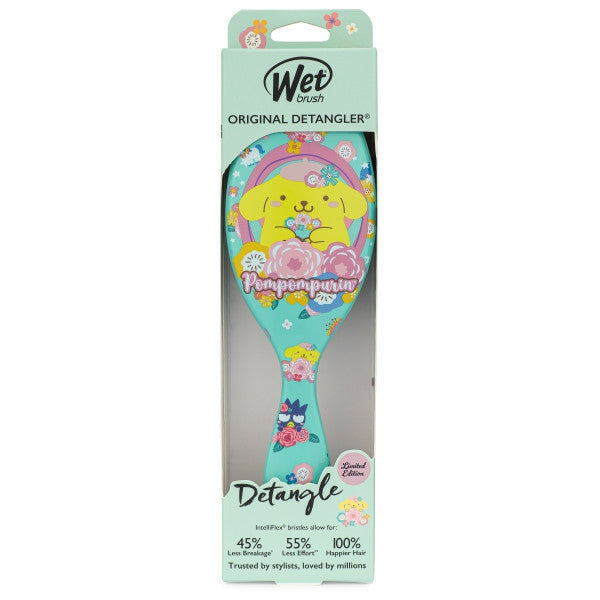 Hello Kitty detangler brush by Wet Brush featuring colorful floral design and pompom character
