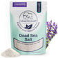 A package of Natural Elephant Lavender Dead Sea Salt with lavender flowers and salt beside it. The packaging features organic lavender essential oil and 100% pure, all natural Dead Sea salt to enhance your relaxation routine.