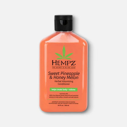 An 8.5oz bottle of Hempz Conditioner, orange with a black cap and green hemp leaf graphics—available in Sweet Pineapple & Honey Melon or Sparkling Peach scents.