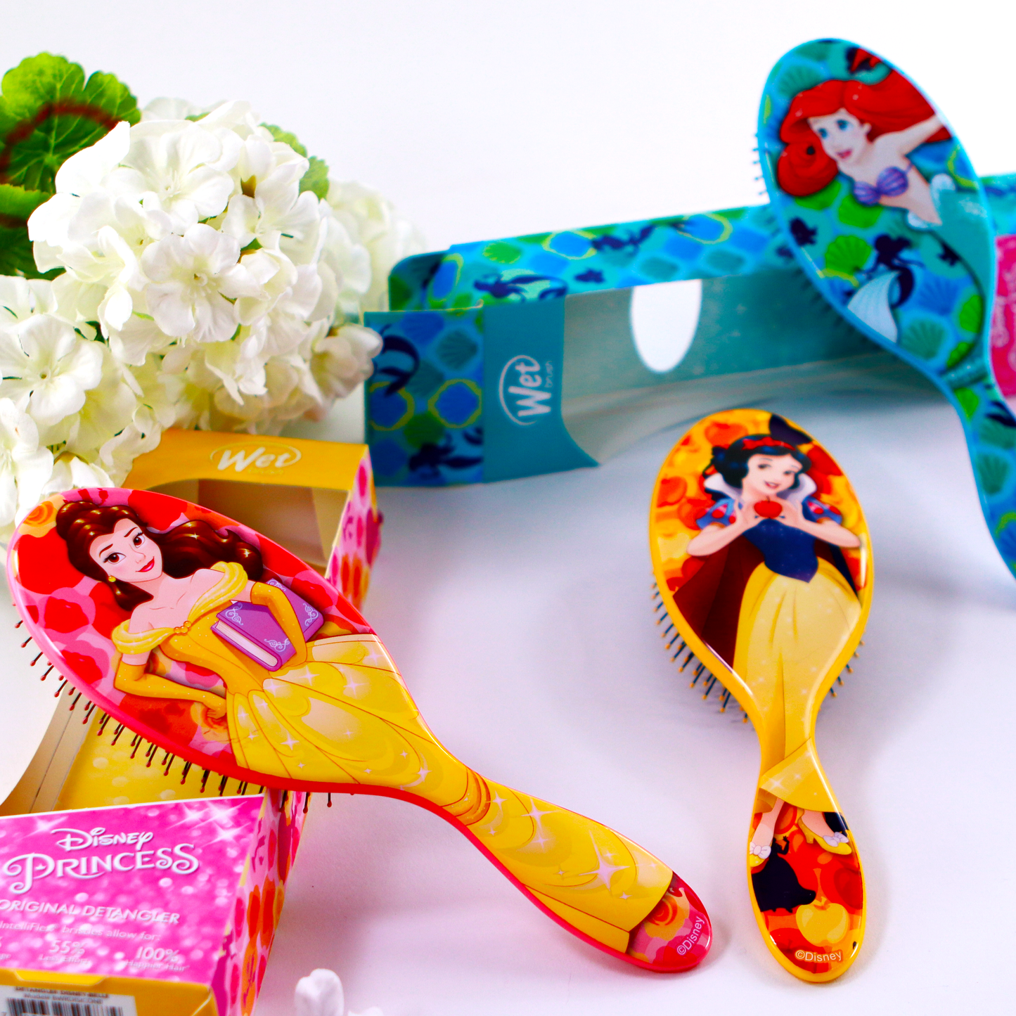 Disney Princess detangler brush set featuring Belle and Snow White designs for easy hair styling