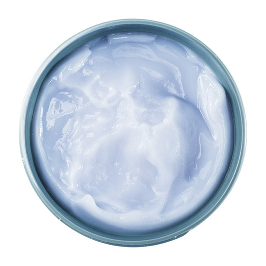 Johnny B. After Shave Balm in a blue container for soothing post-shave skin care