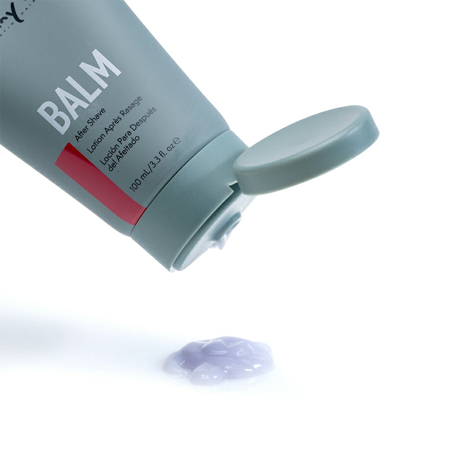 Johnny B. After Shave Balm in a tube with a flip cap dispensing a small amount of lotion