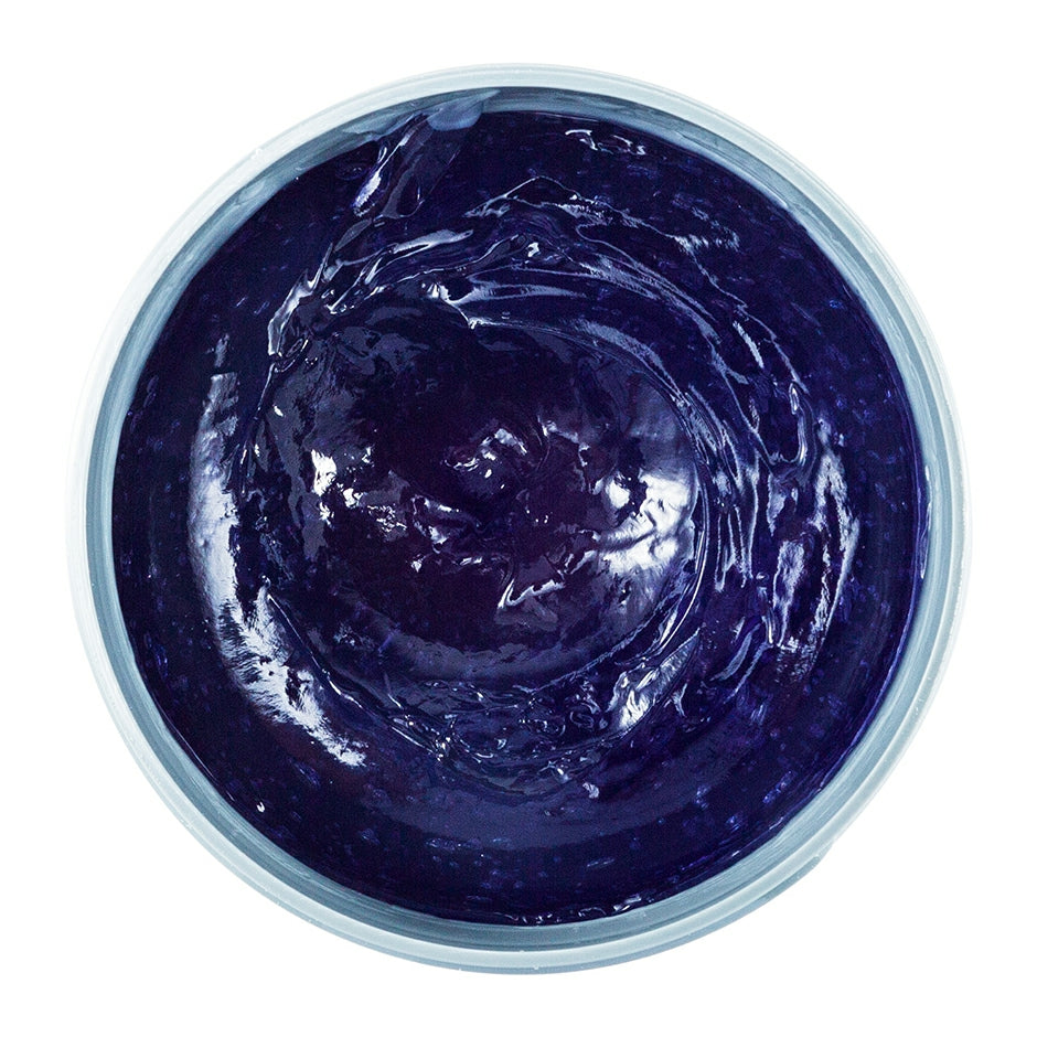 Johnny B Control Styling Gel in a clear container, showcasing its thick, dark formulation for easy hair styling