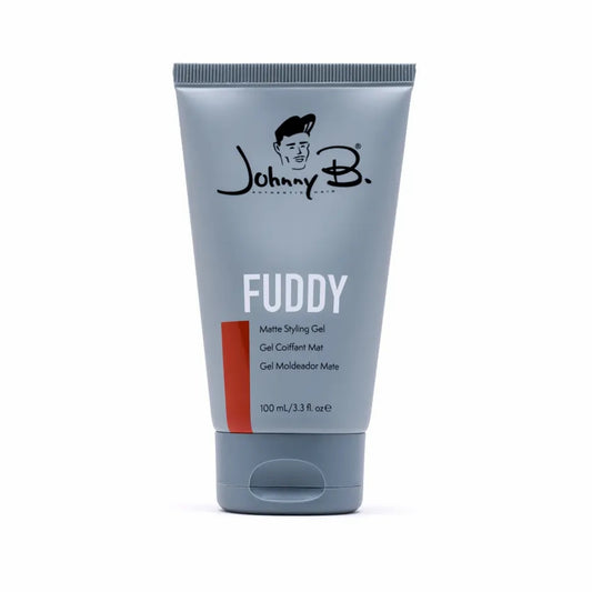 Johnny B Fuddy Matte Gel in a gray tube for styling and holding hair with a matte finish