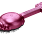 Knot Genie detangling brush in pink, designed for easy hair detangling without breakage