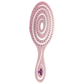 Knot Genie Detangling Hair Brush in Soft Pink with Innovative Spiral Design for Easy Tangle Removal