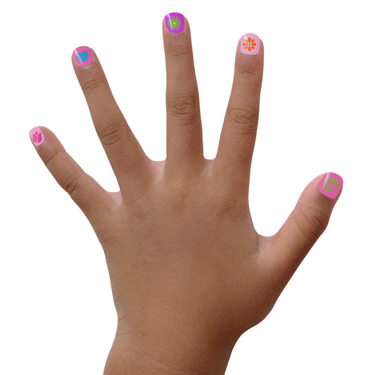 Child's hand decorated with colorful Piggy Paint nail art stickers featuring flowers and hearts