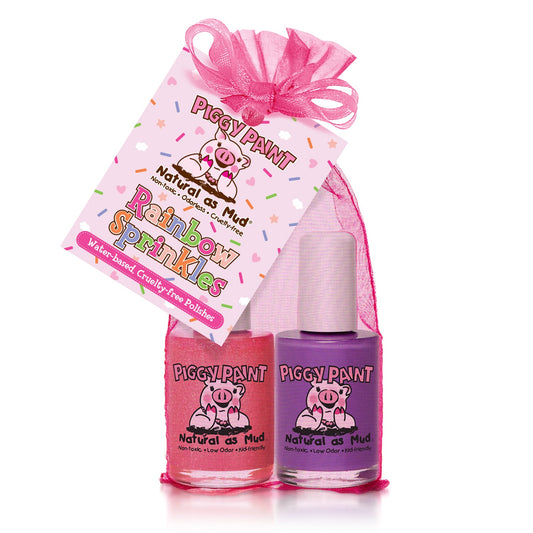 Piggy Paint Rainbow Sprinkles gift set featuring two pastel nail polishes in pink and purple with a gift tag
