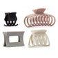 Wet Brush Graphic Monochrome Kit featuring stylish hair clips in black, pink, gray, and white colors