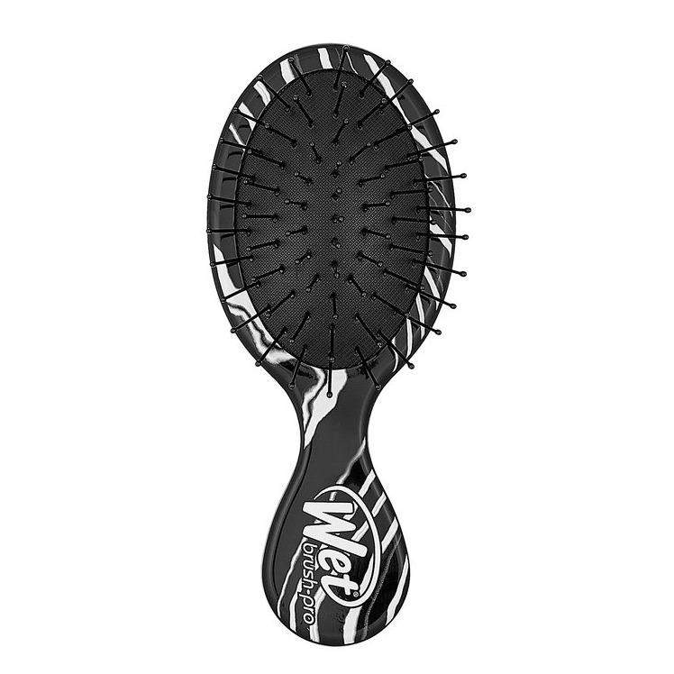 Wet Brush Mini Detangler featuring a sleek design for easy hair detangling on the go