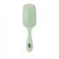 Wet Brush oil infused detangling brush in mint green for smooth, stress-free hair care.