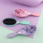 Wet Brush Pro Detangler Crackled Quartz brushes in pink, purple, and teal for tangle-free styling